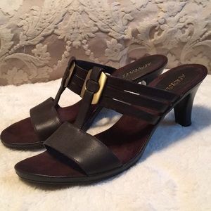 Brown sandals with brass accent